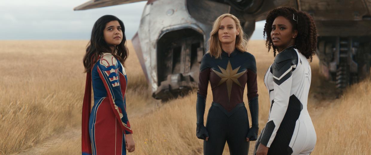 Iman Vellani (far left), Brie Larson and Teyonah Parris play the female heroes of "The Marvels."