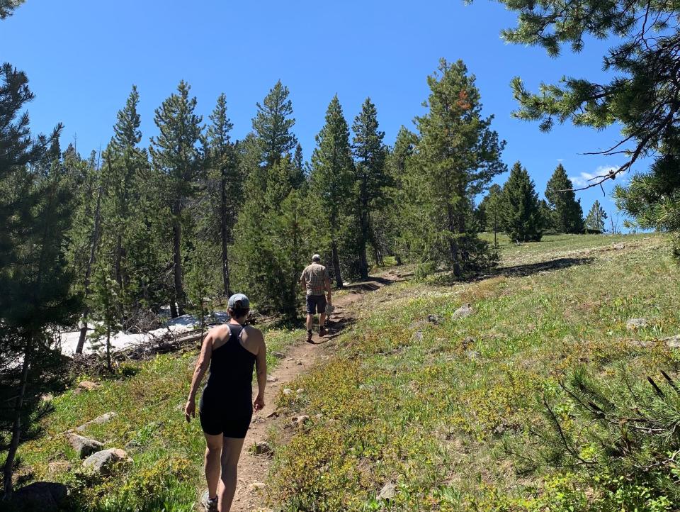 Two hikers on a trail in Montana