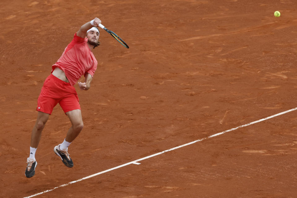 Stefanos Tsitsipas of Greece plays a shot to Casper Ruud of Norway during the final of the Barcelona Open tennis tournament in Barcelona, Spain, Sunday, April 21, 2024. (AP Photo/Joan Monfort)