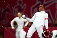 LONDON, ENGLAND - AUGUST 11: Adam Marosi of Hungary celebrates winning a bout in the fencing during the Men's Modern Pentathlon on Day 15 of the London 2012 Olympic Games on August 11, 2012 in London, England. (Photo by Quinn Rooney/Getty Images)