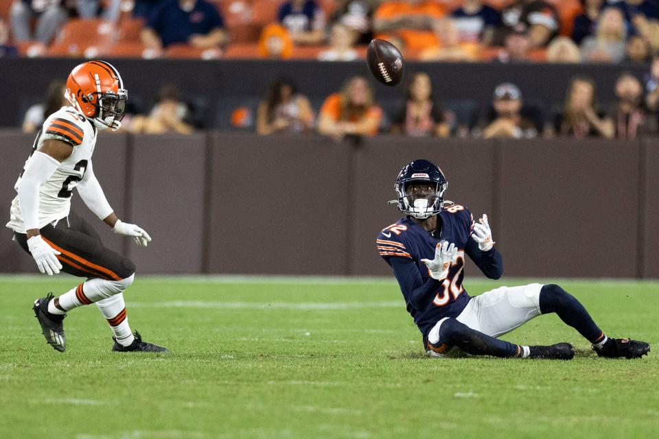 Bears wide receiver Isaiah Coulter catches a pass while on the ground during a preseason game against the Browns in August.