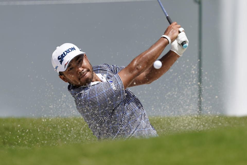 Hideki Matsuyama, of Japan, hits from a bunker during practice for the Tour Championship golf tournament at East Lake Golf Club Thursday, Sept. 3, 2020, in Atlanta. (AP Photo/John Bazemore)