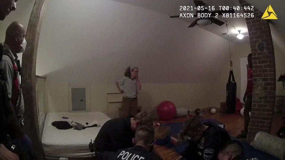 This image provided by American Civil Liberties Union of Vermont shows Burlington Police Department body cam footage of a police interaction with a Black teen late evening on May 15, 2021 in Burlington, Vt. A mother wanted to teach her then 14-year-old son a lesson after he stole electronic cigarettes from a gas station so she called police. A lawsuit by the mother alleges the Burlington police used excessive force and discriminated against her unarmed son. (Burlington Police Department/American Civil Liberties Union of Vermont via AP)