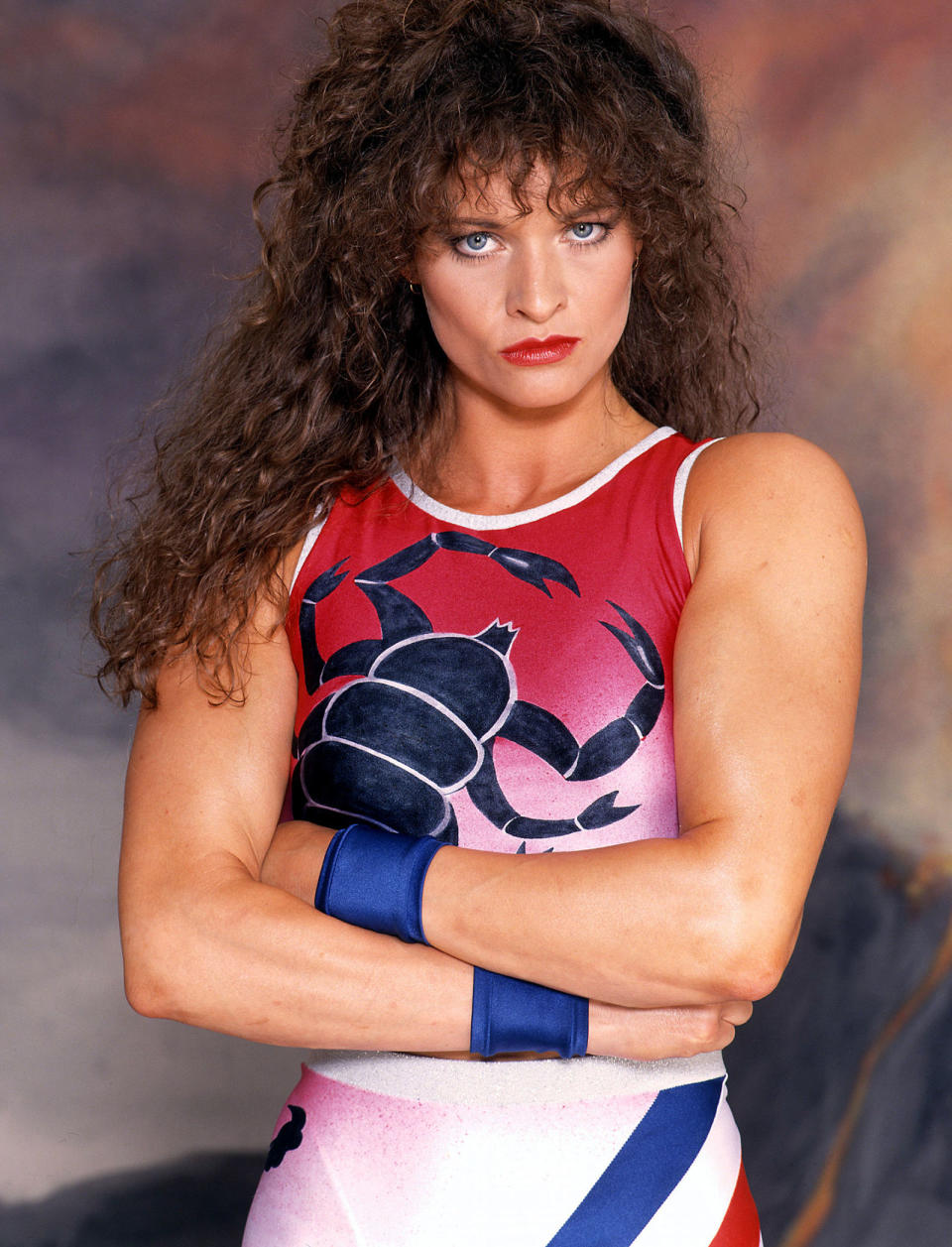 <p>Contenders were subjected to the mighty sting of the speedy Scorpio. Former bodybuilder and model Nikki Diamond was an original Gladiator, but was forced to pull out after series 3 when she sustained a severe back injury while taking part in a panto.</p><p>Prior to <em>Gladiators</em>, the star made her screen debut in <em>Monty Python's The Meaning of Life</em>, telling the <a rel="nofollow noopener" href="http://www.express.co.uk/life-style/life/512270/Scorpio-Gladiators-Nikki-Diamond" target="_blank" data-ylk="slk:Express;elm:context_link;itc:0;sec:content-canvas" class="link "><em>Express</em></a> in a recent interview: "I was one of many girls running around London not wearing much!" She also appeared in Eric Idle and Robbie Coltrane's <em>Nuns on the Run</em>, and <em>Slipstream</em> with <em><a rel="nofollow noopener" href="http://www.digitalspy.com/movies/star-wars/" target="_blank" data-ylk="slk:Star Wars;elm:context_link;itc:0;sec:content-canvas" class="link ">Star Wars</a></em> actor Mark Hamill.</p><p>On how she got onto the show, Nikki added: "I was always a fan of the American series of <em>Gladiators</em> and watched it avidly, even though it was transmitted here in the early hours of Saturday morning. It was an amazing show and I wanted to have a go.</p><p>"My then-husband noticed an advert in a newspaper confirming it was coming over to the UK and anyone interested should apply. We sent in some pictures and Nigel Lythgoe, the producer, contacted me and said he wanted to see me. I was offered a contract, the first Gladiator to be offered one."</p><p>After leaving <em>Gladiators</em>, Nikki worked as a reporter for <em>Watchdog</em>, and made 48 episodes of the children's programme <em>Demolition Dad</em>. She currently runs the Chun Ming Dao Martial Arts Association in Epsom with her partner Neil Webster.</p><p>Nikki also revealed that Michael Willson (Cobra) was her best friend on the show, and that the pair kept in touch up until recently.</p>