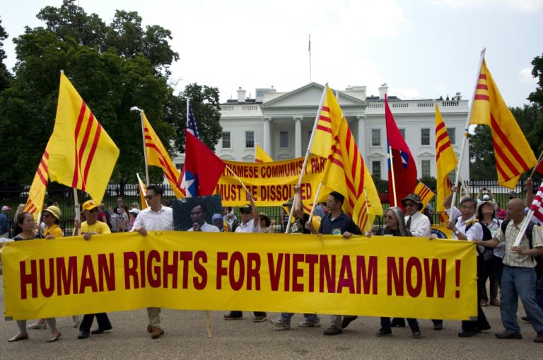 Human rights protesters outside the White House during the meeting of the US President Barack Obama and the Secretary General of the Communist Party of Vietnam in Washington, DC on July 7, 2015