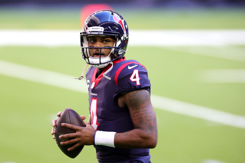 HOUSTON, TEXAS - JANUARY 03: Deshaun Watson #4 of the Houston Texans in action against the Tennessee Titans during a game at NRG Stadium on January 03, 2021 in Houston, Texas. (Photo by Carmen Mandato/Getty Images)