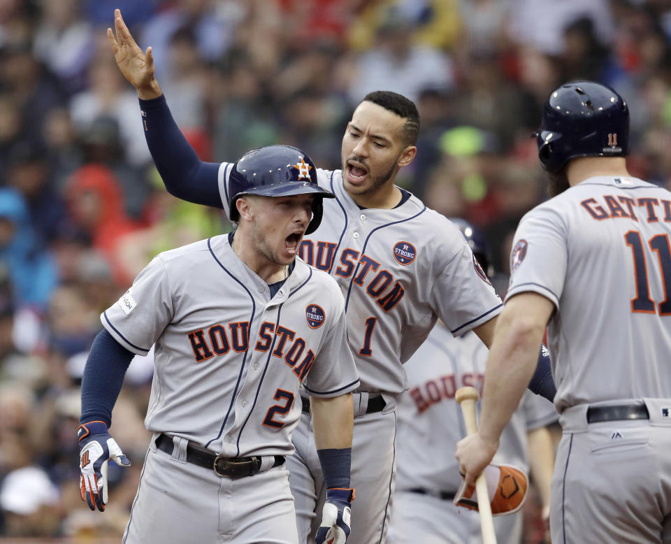 Alex Bregman (No. 2) celebrates his home run during the eighth inning of Game 4 in the ALDS. He was one of several Astros offensive heroes in the series. (AP)