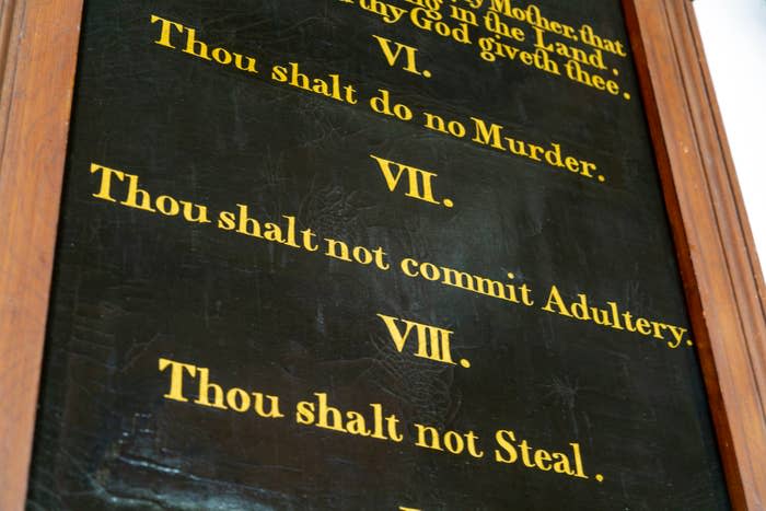 A display of commandments including "Thou shalt do no Murder," "Thou shalt not commit Adultery," and "Thou shalt not Steal."