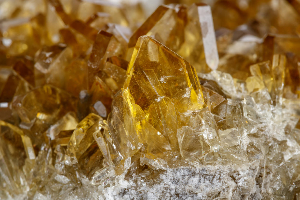 Macro mineral stone baryte crystals, Barite on a white background close up