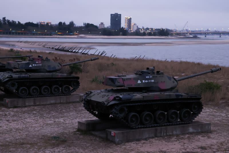 Retired military tanks can be seen on the beach in Kinmen