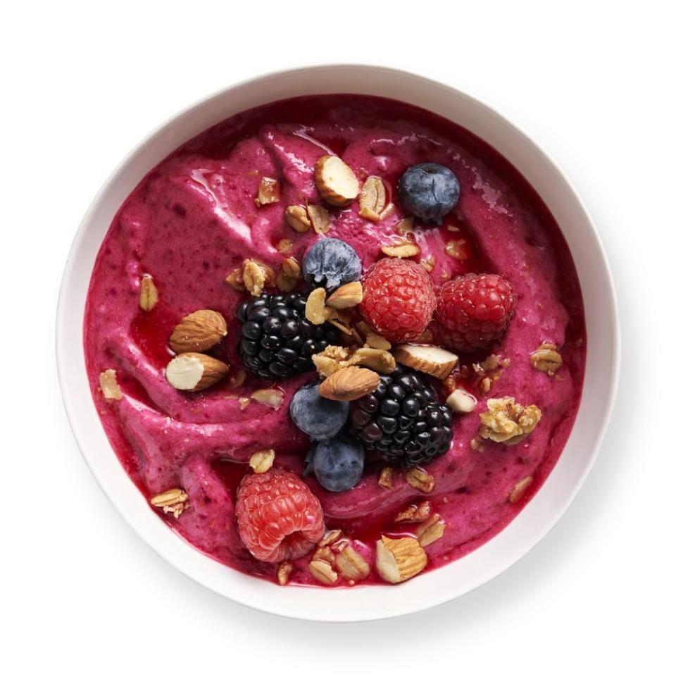 <p>One peeled, cooked beet adds extra-pink color and earthy sweetness to this berry-ful bowl.</p><p>Get the <strong><a href="https://www.womansday.com/food-recipes/a30614816/raspberry-smoothie-bowls-recipe/" rel="nofollow noopener" target="_blank" data-ylk="slk:Raspberry Smoothie Bowl recipe;elm:context_link;itc:0;sec:content-canvas" class="link ">Raspberry Smoothie Bowl recipe</a></strong> from Woman's Day. </p>