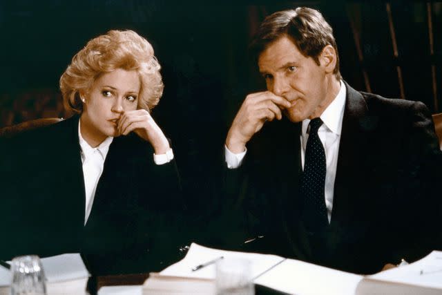 <p>Sunset Boulevard/Corbis via Getty</p> Melanie Griffith and Harrison Ford in 'Working Girl'