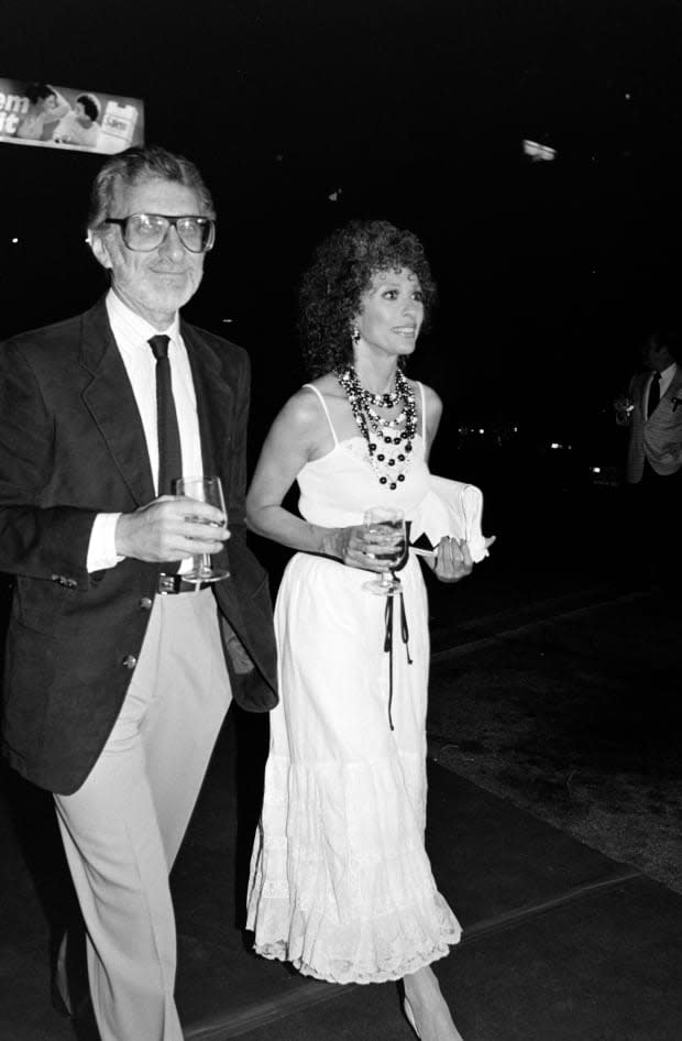 Rita Moreno and husband Leonard Gordon attend a party celebrating Yul Brynner's 4,000th performance in the stage musical "The King and I" in Los Angeles on Sept. 13, 1983.<p><a href="https://www.gettyimages.com/detail/1438481608" rel="nofollow noopener" target="_blank" data-ylk="slk:WWD/Getty Images;elm:context_link;itc:0;sec:content-canvas" class="link ">WWD/Getty Images</a></p>