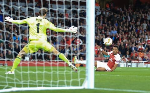 Pierre-Emerick Aubameyang of Arsenal scores the opening goal during the UEFA Europa League Group E match between Arsenal and Vorskla Poltav - Credit: Marc Atkins/Getty Images