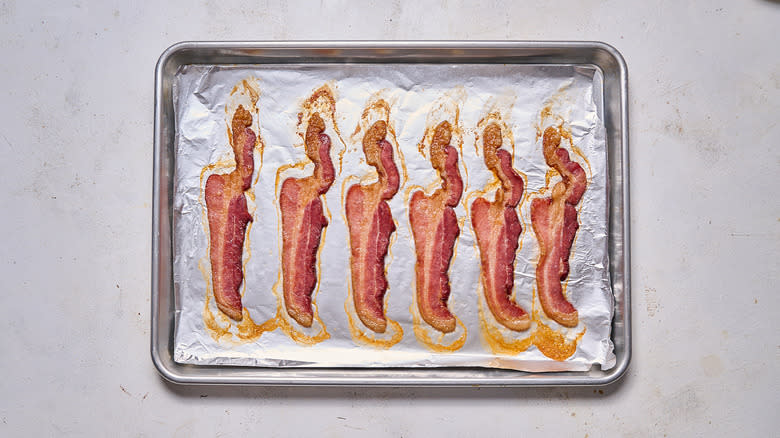 cooked bacon on sheet tray