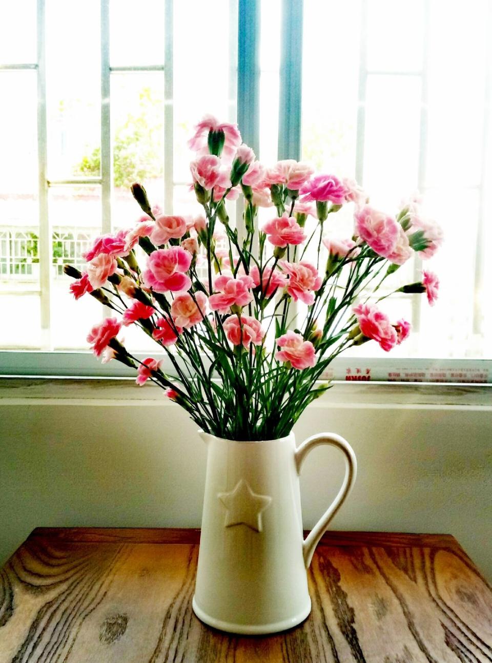 flower vase on table at home