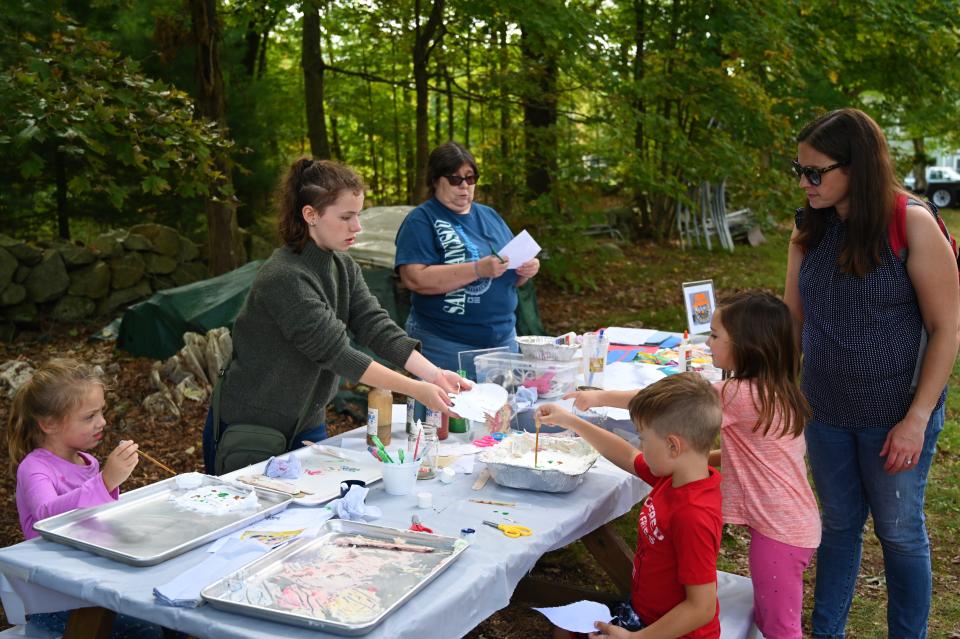 Children enjoy arts and crafts during last year's Fall Festival at the Medway Community Farm.