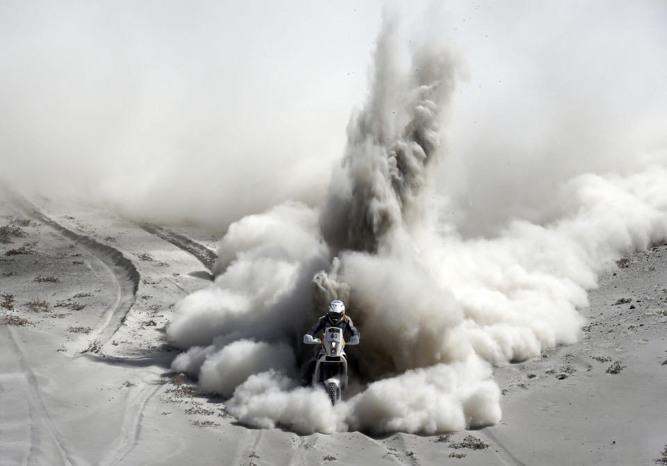 South Africa's Riaan Van Niekerk rides his KTM during the 5th stage of the Dakar Rally 2013 from Arequipa in Peru to Arica in Chile, January 9, 2013. Picture taken January 9, 2013. REUTERS/Jacky Naegelen (CHILE - Tags: SPORT MOTORSPORT TPX IMAGES OF THE DAY)