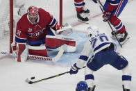 Montreal Canadiens goaltender Carey Price (31) makes a save against Tampa Bay Lightning center Blake Coleman (20) during the first period of Game 4 of the NHL hockey Stanley Cup final in Montreal, Monday, July 5, 2021. (Paul Chiasson/The Canadian Press via AP)