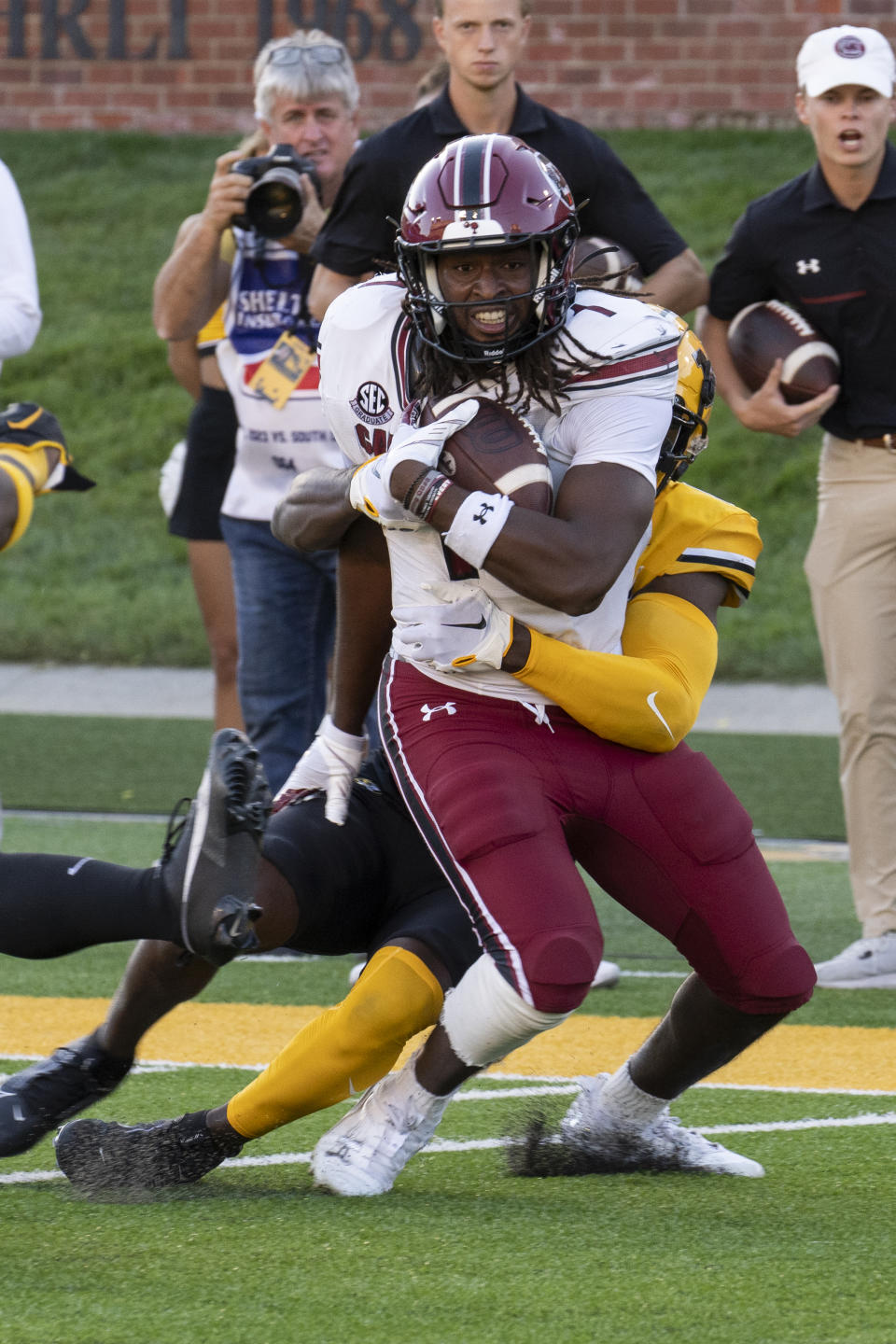 South Carolina tight end Trey Knox, top, is tackled by Missouri defensive back Jaylon Carlies during the fourth quarter of an NCAA college football game Saturday, Oct. 21, 2023, in Columbia, Mo. Missouri won 34-12. (AP Photo/L.G. Patterson)