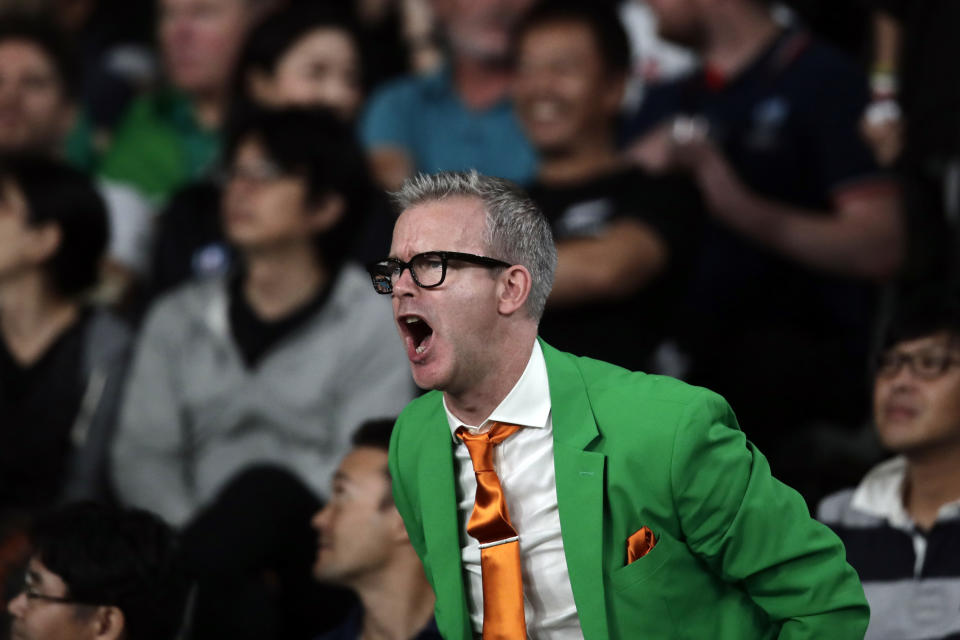 An Ireland fan yells as he reacts during the Rugby World Cup quarterfinal match at Tokyo Stadium between New Zealand and Ireland in Tokyo, Japan, Saturday, Oct. 19, 2019. (AP Photo/Jae C. Hong)