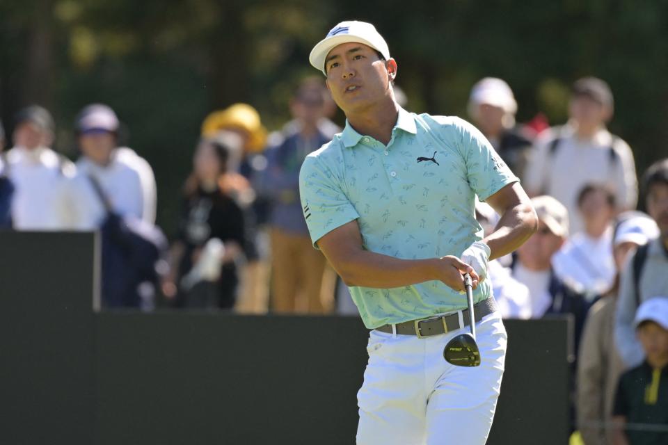 Justin Suh of the USA watches the ball after teeing off at the 8th hole during the third round of Zozo Championships PGA golf tournament at the Narashino Country Club in Inzai, Chiba prefecture on October 21, 2023. (Photo by Toshifumi KITAMURA / AFP)