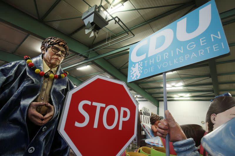 A papier mache figure for carnival floats depicting Annegret Kramp-Karrenbauer, outgoing leader of the Christian Democratic Union (CDU), is pictured during preparations for the upcoming Rose Monday carnival parade in Mainz