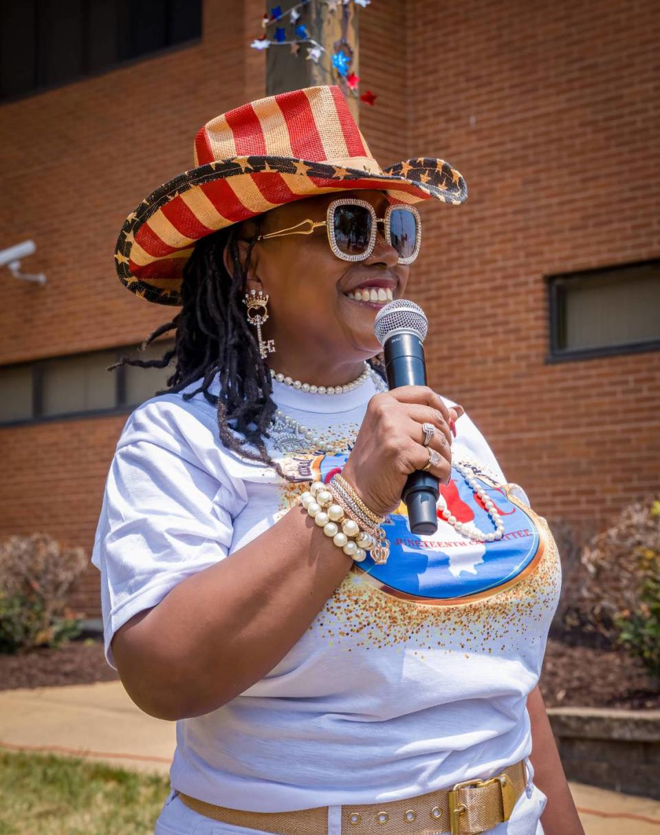 Stephanie Bush Taylor, chairperson of the Illinois Juneteenth Committee and president of the East St. Louis nonprofit, Community Development Sustainable Solutions, speaks to the crowd during the Juneteenth/618 Day Celebration in East St. Louis on Saturday, June 17. 