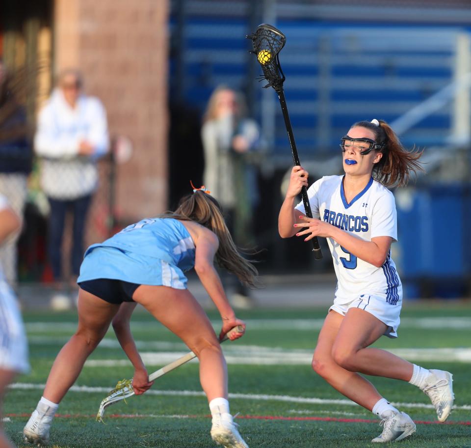 Bronxville's Megan Krestinski (5) puts a shot on goal during their 16-7 win over Suffern in girls lacrosse action at Haindl Field in Eastchester on Friday, April 22, 2022.