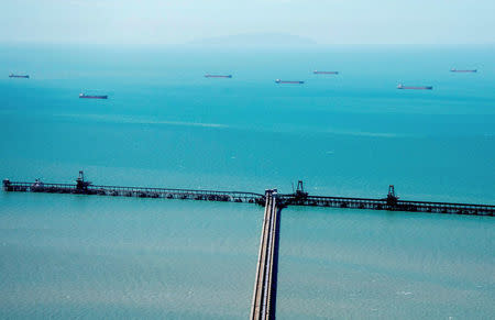 FILE PHOTO: Coal ships are seen anchored off the Hay Point and Dalrymple Bay Coal Terminals that receive coal along the Goonyella rail system, that services coal mines in the Bowen Basin, located south of the Queensland town of Mackay in Australia, April 11, 2017. REUTERS/Daryl Wright/File Photo