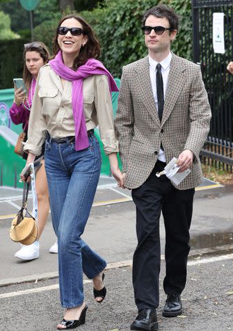<p>Neil Mockford/GC Images</p> Alexa Chung and Tom Sturridge attend day seven of the Wimbledon Tennis Championships on July 09, 2023 in London, England.