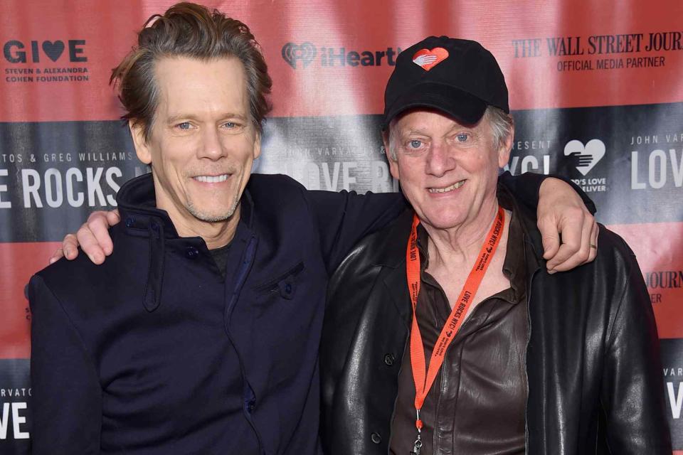 <p>Jamie McCarthy/Getty </p> Kevin Bacon and his brother Michael Bacon in 2018.