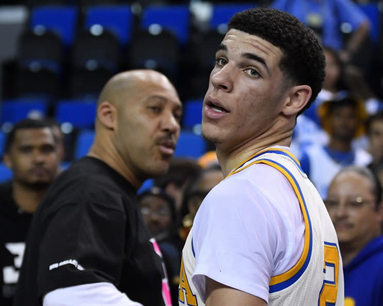 LaVar Ball and Lonzo Ball after a Pac-12 game in March. (AP)