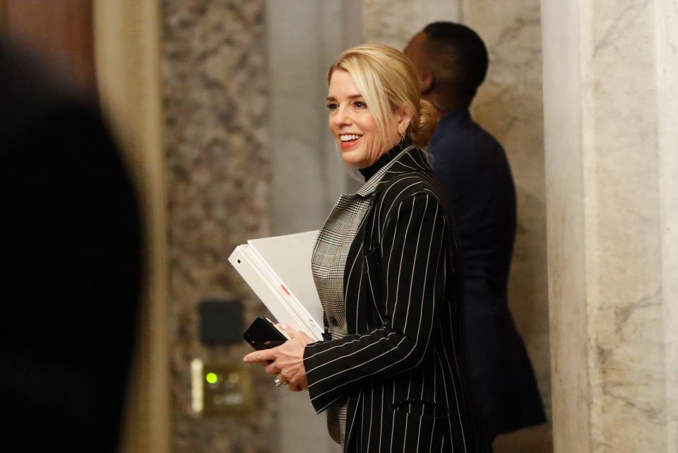 White House adviser and former Florida Attorney General Pam Bondi arrives at the Capitol in Washington during the impeachment trial of President Donald Trump on charges of abuse of power and obstruction of Congress, Thursday, Jan. 23, 2020.