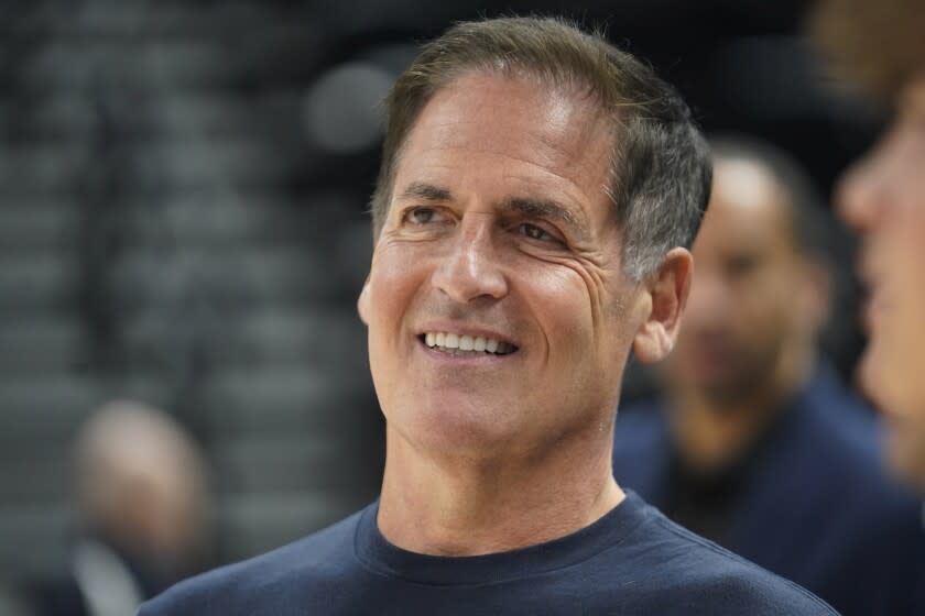 Mark Cuban, owner of the Dallas Mavericks, watches warm ups before Game 6 of an NBA basketball first-round playoff series against the Utah Jazz, Thursday, April 28, 2022, in Salt Lake City. (AP Photo/Rick Bowmer)