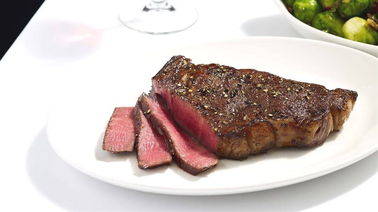 Dry-aged steak white plate