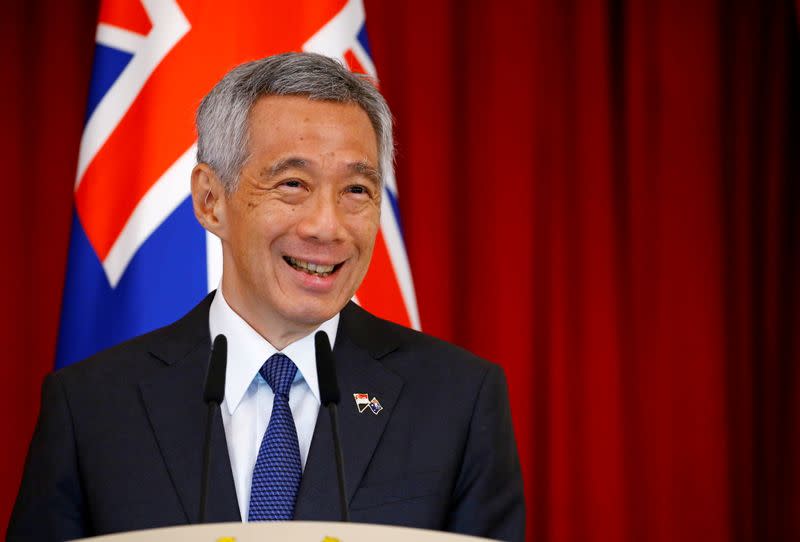 FILE PHOTO: Singapore's Prime Minister Lee Hsien Loong speaks at the Istana in Singapore