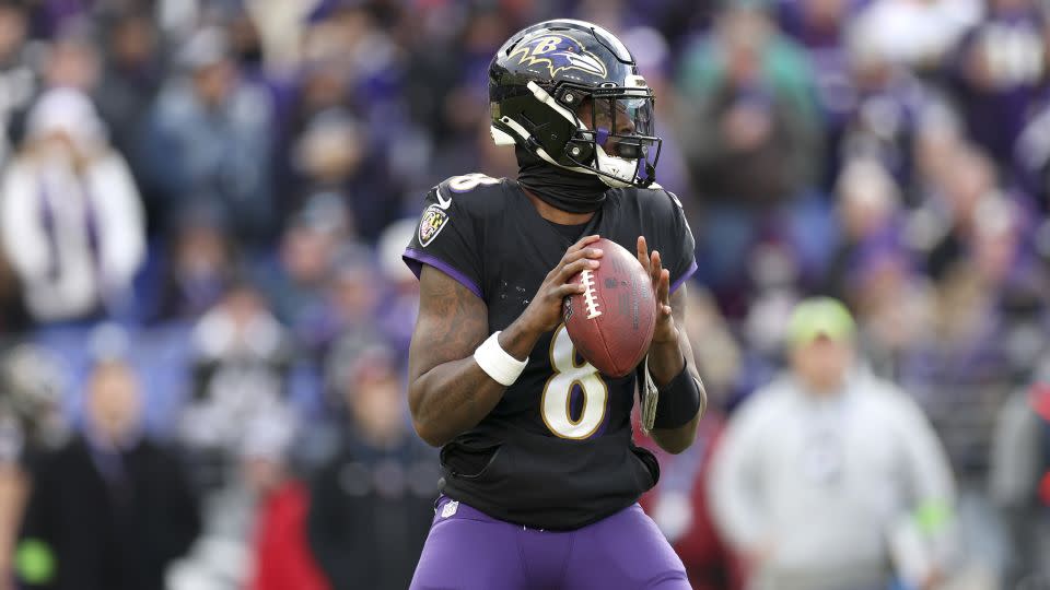 Jackson drops back to pass against the Dolphins. - Rob Carr/Getty Images