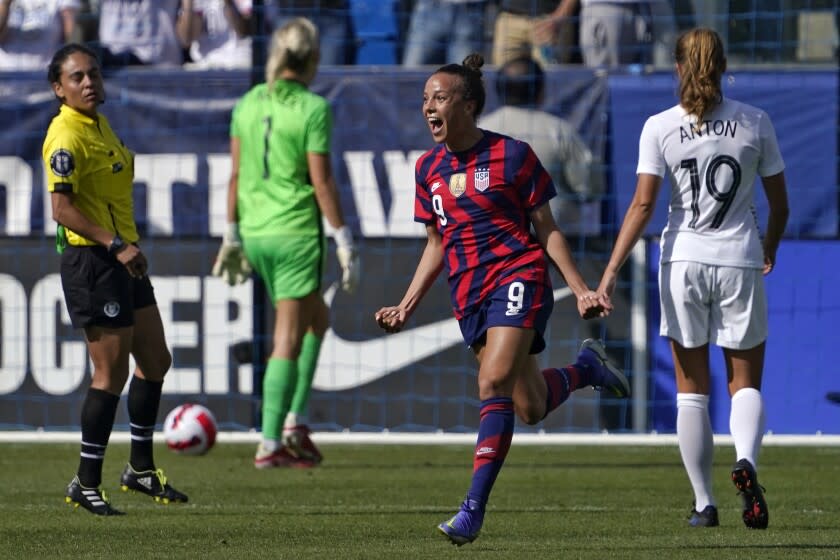 United States forward Mallory Pugh, second from right, celebrates her goal as New Zealand goalkeeper Erin Nayler.