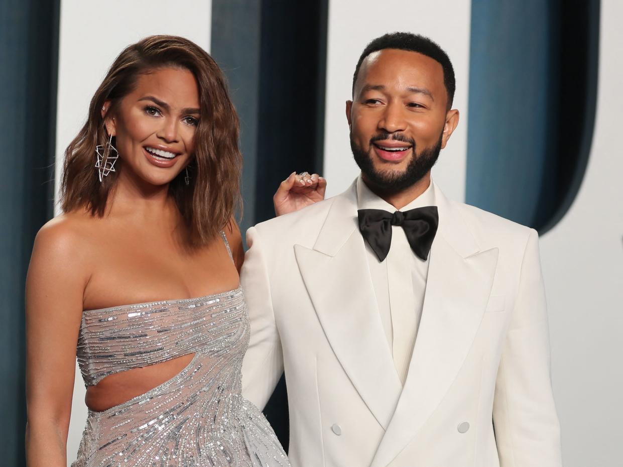 John Legend (with wife Chrissy Teigen) is discussing his fallout with Kanye West over politics. (Photo: REUTERS/Danny Moloshok)