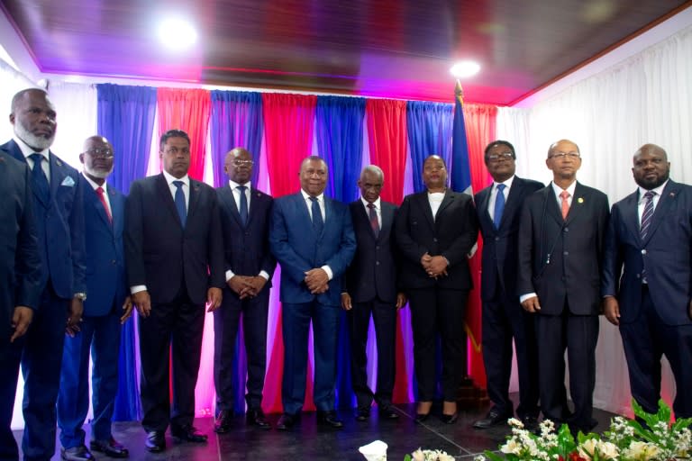 The members of Haiti's transitional council pose after being sworn in on April 25, 2024 in Port-au-Price (Clarens SIFFROY)