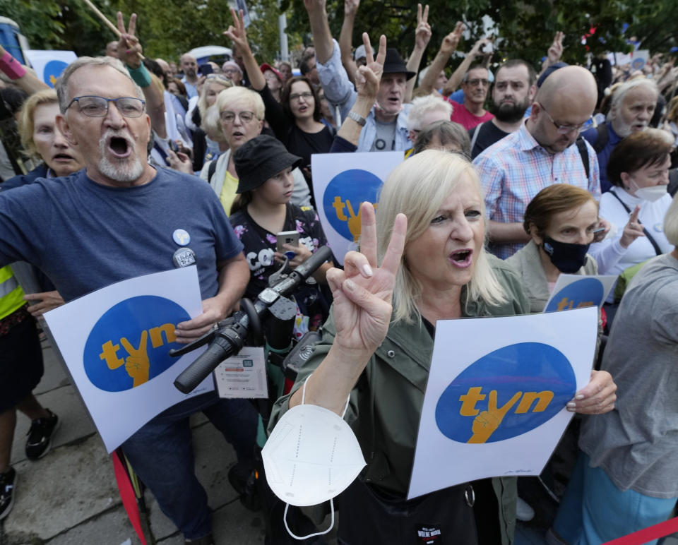 People demonstrate in defense of media freedom in Warsaw, Poland, on Tuesday, Aug. 10, 2021. Poles demonstrated nationwide Tuesday against a bill widely viewed as a effort by the country's nationalist ruling party to silence an independent, U.S.-owned television broadcaster that is critical of the government.(AP Photo/Czarek Sokolowski)