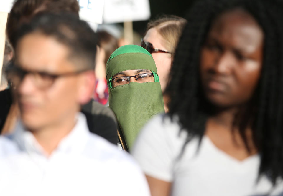 People protest Quebec's new Bill 21 in Montreal on June 17. (Photo: Christinne Muschi / Reuters)