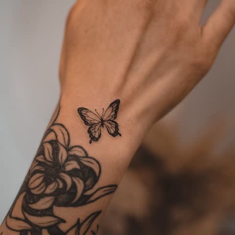 white ink butterfly tattoo