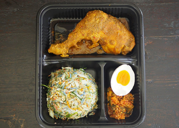 The 'nasi ulam' comes in a container with compartments