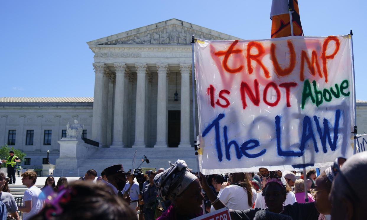 <span>Protesters gather on 1 July 2024 after the US supreme court ruled that Donald Trump is entitled to immunity from prosecution in the context of his official acts.</span><span>Photograph: Will Oliver/EPA</span>