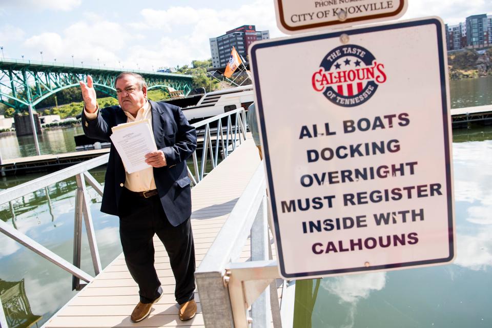 Knoxville restauranteur Mike Chase on the dock outside of Calhoun's, his restaurant in downtown Knoxville.