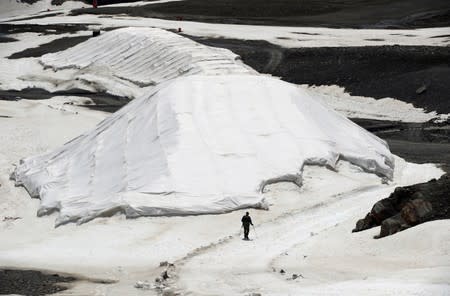 The Wider Image: Scientists race to read Austria's melting climate archive