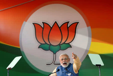 FILE PHOTO: India's Prime Minister Narendra Modi addresses an election campaign rally ahead of the Karnataka state assembly elections in Bengaluru, India, February 4, 2018. REUTERS/Abhishek N. Chinnappa/File photo