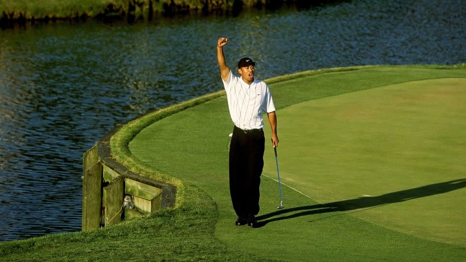 Woods celebrates his now-iconic putt. - Stan Badz/PGA Tour/Getty Images